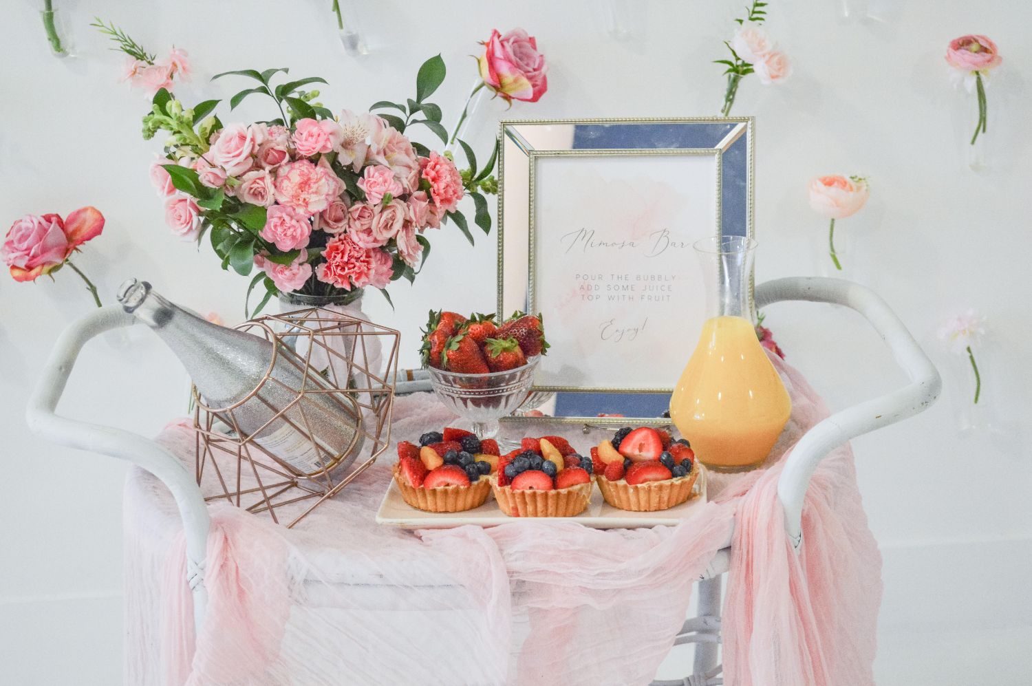 https://onestylishparty.com/wp-content/uploads/2021/05/floral-mothers-day-mimosa-bar.jpg